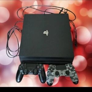 Sony Black Console with Black and Camo Controllers